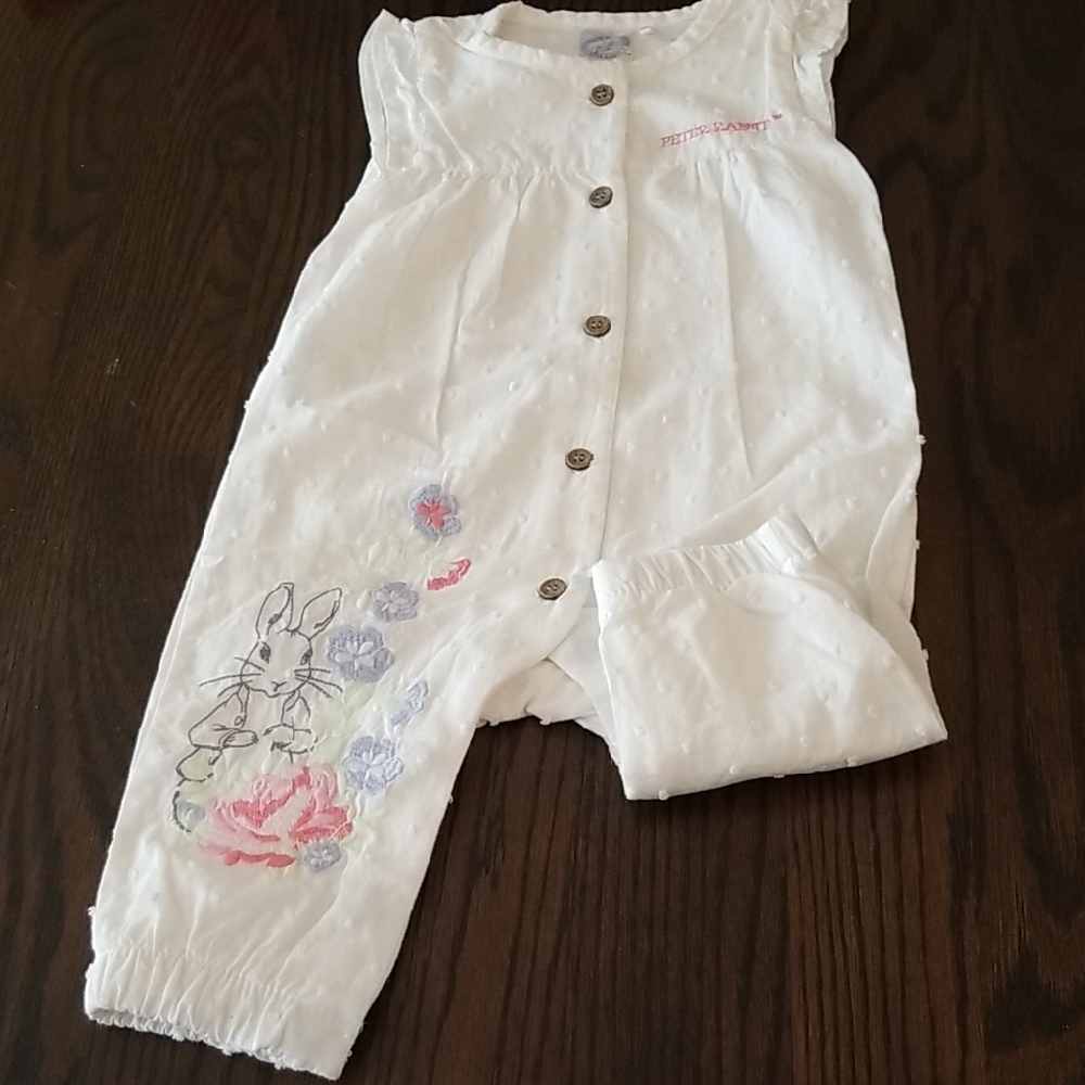 White Peter Rabit Baby Girl Romper With Really Cute Design On Leg. Size 3-6mth